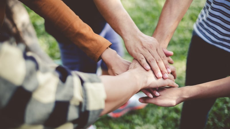 A group of people coming together to help with a move